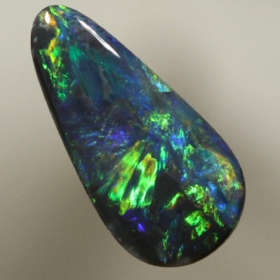SOLID BLACK OPAL Bright orange plays along side green over blue